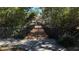 A walking bridge leads to the community common area at 764 Captiva Ne Ct, St Petersburg, FL 33702
