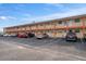 Apartment complex exterior with parking in front, providing convenience and a welcoming atmosphere for residents at 8565 W Gulf Blvd # 17S, Treasure Island, FL 33706