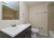 Bathroom with a white countertop vanity and mirror, along with a toilet at 10118 Hickory Hill, Port Richey, FL 34668