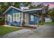 Charming single-Gathering home featuring a quaint covered porch and well-manicured lawn at 1214 E Curtis St, Tampa, FL 33603