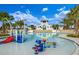 Community splash pool with slides, fountains and plenty of room for play at 14214 Quintessa Ln, Lithia, FL 33547