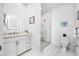 Bright bathroom features a marble floor, modern shower, and sink with generous cabinet space at 644 3Rd S Ave # 305, St Petersburg, FL 33701
