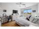 This bedroom boasts hardwood floors, a large window, and an adjacent vanity at 644 3Rd S Ave # 305, St Petersburg, FL 33701