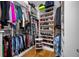 Walk-in closet with custom shelving and organization, ideal for optimal storage at 644 3Rd S Ave # 305, St Petersburg, FL 33701