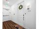 Apartment entryway featuring a door with a wreath and a 