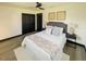 Bedroom featuring bright natural light and closet at 8722 Elmwood Ln, Tampa, FL 33615