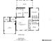 Detailed floor plan showcasing layout with living room, bedrooms, sunroom, and garage at 8722 Elmwood Ln, Tampa, FL 33615