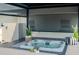 Hot tub on a private deck, creating a serene and luxurious outdoor relaxation space at 8722 Elmwood Ln, Tampa, FL 33615