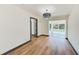 Open living area with lots of natural light and wood floors at 8722 Elmwood Ln, Tampa, FL 33615