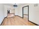 Spacious living room with wood floors and open layout at 8722 Elmwood Ln, Tampa, FL 33615