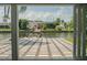 Water view from inside the home, offering a glimpse of the waterfront living and outdoor space at 8722 Elmwood Ln, Tampa, FL 33615