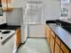 Efficient kitchen with classic appliances and ample counter space for meal preparation at 12189 Armenia Gables Cir # 12189, Tampa, FL 33612