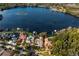 Picturesque aerial view of waterfront properties with private docks, serene lake, and beautifully landscaped yards at 1903 Haven Bend, Tampa, FL 33613