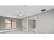 Bright bedroom featuring neutral walls, carpet, and a window with a view at 1903 Haven Bend, Tampa, FL 33613