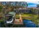 This lakefront home has a private dock with boat lift and waterfront access at 1903 Haven Bend, Tampa, FL 33613