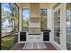 Outdoor kitchen with grill, sink, and storage offers a seamless indoor-outdoor living experience at 1903 Haven Bend, Tampa, FL 33613