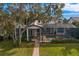 Gorgeous back patio with a pool and outdoor entertaining space at 1903 Haven Bend, Tampa, FL 33613