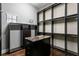 Spacious walk-in closet with built-in shelving, drawers, and a marble-topped island at 1903 Haven Bend, Tampa, FL 33613