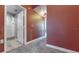 Upstairs hallway with carpet and glass railing at 200 4Th S Ave # 139, St Petersburg, FL 33701