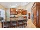 Beautiful kitchen featuring custom cabinetry, granite countertops, and stainless steel appliances at 363 Sanctuary Dr, Crystal Beach, FL 34681