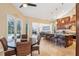 A luxurious kitchen with a center island and eat in breakfast nook and views of the living room and pool at 363 Sanctuary Dr, Crystal Beach, FL 34681