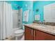 Clean bathroom featuring a shower-tub combo, granite counters, and an updated vanity at 714 Sugar Camp Way, Brooksville, FL 34604