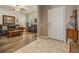 Bright entryway featuring tile flooring and a view into the living room at 714 Sugar Camp Way, Brooksville, FL 34604