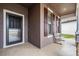 Inviting front porch with bench seating, perfect for enjoying the outdoors at 714 Sugar Camp Way, Brooksville, FL 34604