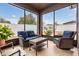 Relaxing screened lanai with comfortable seating, perfect for enjoying the outdoors at 714 Sugar Camp Way, Brooksville, FL 34604