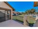 Balcony view overlooking pool area, palm trees and lawn at 8005 Bardmoor Pl # 202I, Seminole, FL 33777