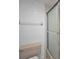 Clean bathroom featuring a bathtub with shower, a toilet, and a towel rack at 8005 Bardmoor Pl # 202I, Seminole, FL 33777