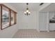 Bright breakfast nook area with window for natural light; adjacent to kitchen area at 8005 Bardmoor Pl # 202I, Seminole, FL 33777