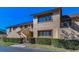 Inviting two-story condo featuring updated windows, a private balcony and mature landscaping at 8005 Bardmoor Pl # 202I, Seminole, FL 33777