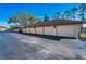 Multiple private garages offer ample parking and storage space for residents at 8005 Bardmoor Pl # 202I, Seminole, FL 33777