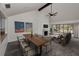Bright, open-concept living and dining area featuring a fireplace and abundant natural light at 8005 Bardmoor Pl # 202I, Seminole, FL 33777