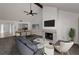 Spacious living room area with high ceilings, fireplace, with living room open to the kitchen at 8005 Bardmoor Pl # 202I, Seminole, FL 33777