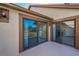 The patio features sliding glass doors to the interior and an exterior view from the balcony and is perfect for relaxing outdoors at 8005 Bardmoor Pl # 202I, Seminole, FL 33777