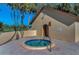 Community spa with a small building for changing and a beautiful golf course in the background at 8005 Bardmoor Pl # 202I, Seminole, FL 33777