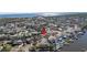 Wide aerial view of neighborhood showcasing the home's location near the water at 8418 Flagstone Dr, Tampa, FL 33615