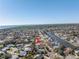 Expansive aerial view showcasing the charming home with a waterfront community and serene views at 8418 Flagstone Dr, Tampa, FL 33615