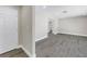Bright living room with hardwood style floors and white trim at 8418 Flagstone Dr, Tampa, FL 33615