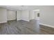 Bright living room with hardwood style floors and backyard view at 8418 Flagstone Dr, Tampa, FL 33615