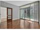 Bedroom with sliding glass door and balcony access at 111 N 12Th St # 1619, Tampa, FL 33602