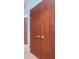 Close up of wood closet doors with metal handles at 111 N 12Th St # 1619, Tampa, FL 33602