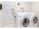 Laundry room with a modern washer and dryer at 111 N 12Th St # 1619, Tampa, FL 33602