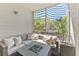 Relaxing screened-in patio with comfortable seating and views at 1203 Bay Club Cir # 1203, Tampa, FL 33607