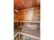 Interior view of a wooden sauna, featuring multiple tiers of seating at 1203 Bay Club Cir # 1203, Tampa, FL 33607