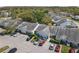 An aerial view showing a well maintained housing community with ample parking at 16211 Rambling Vine W Dr, Tampa, FL 33624