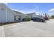 A well kept home with designated parking and trimmed hedges in front at 16211 Rambling Vine W Dr, Tampa, FL 33624