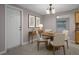 Cozy dining area with a round table, complemented by stylish chairs and decor, perfect for intimate meals at 4925 Beacon Hill Dr, New Port Richey, FL 34652